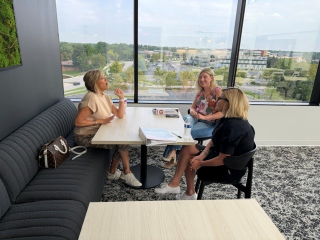 A mentor meeting with a small group of emerging leaders for a Spiritual Board of Advisors session